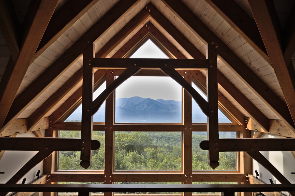 Timber frame gable with mountain view